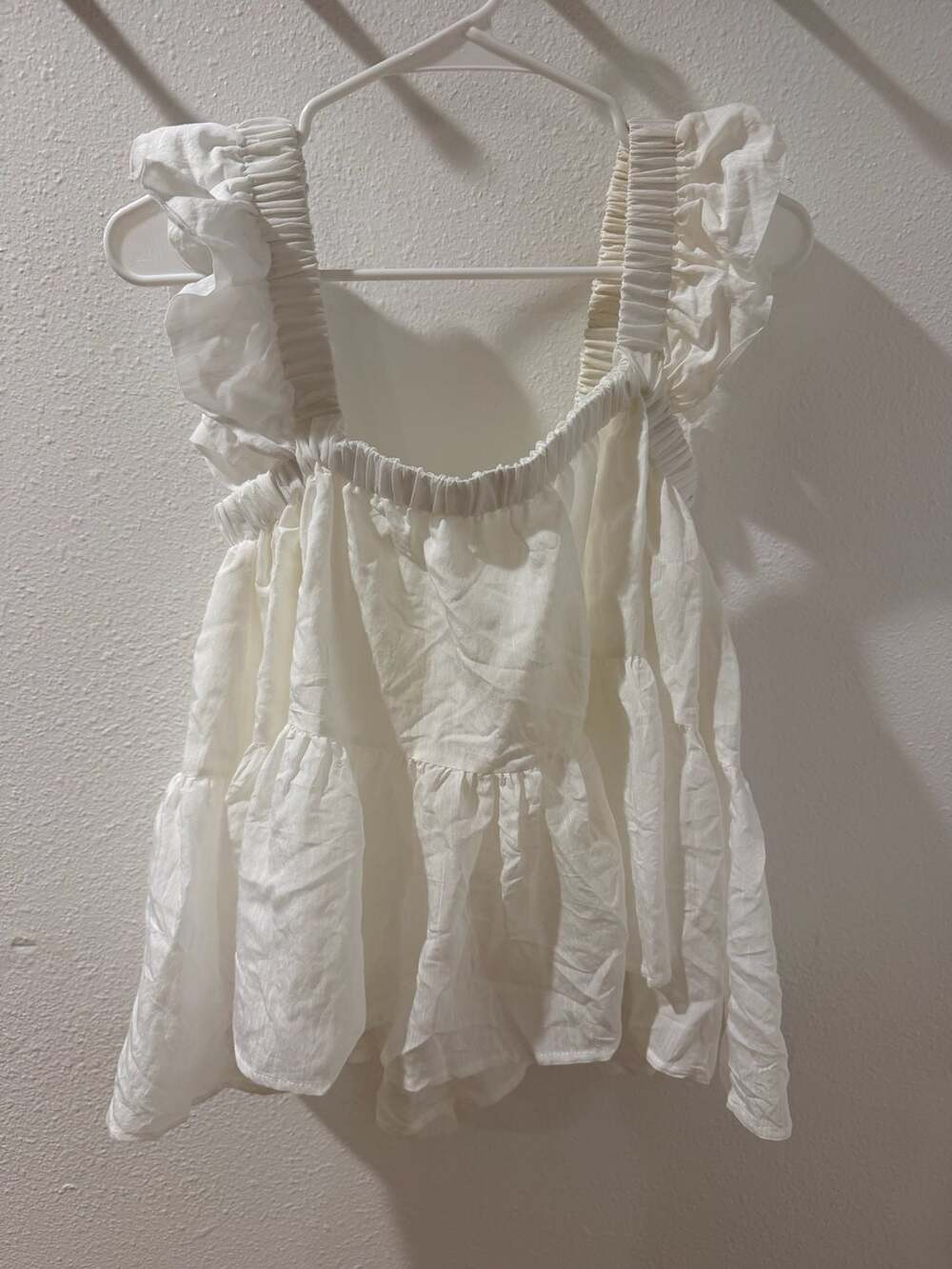 La Lavon White Sleeveless Tiered Ruffle Cami Top with Tie-Back Detail